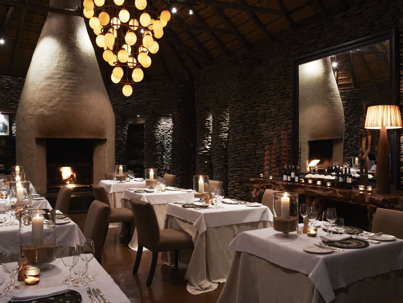 A candlelit lodge dining room