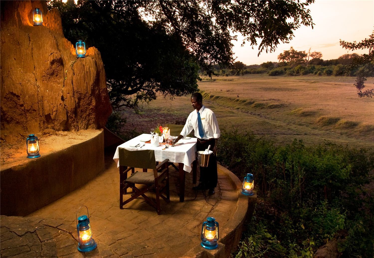 A lantern-lit dinner in the bush